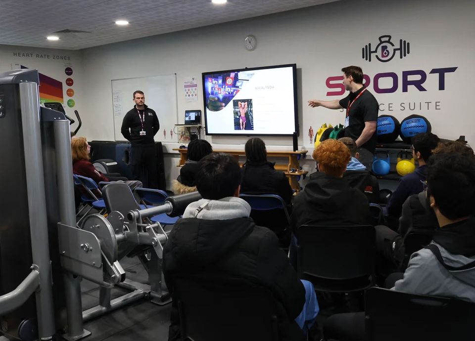 Image of students in talk Image of students in talk