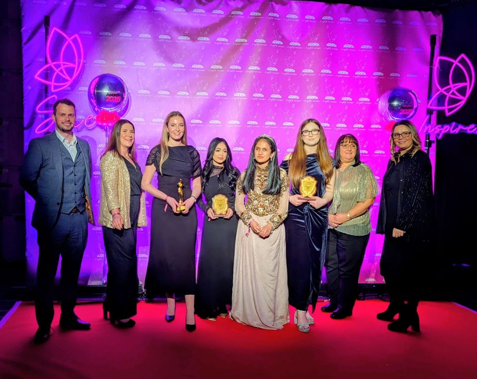 Group image of people at awards ceremony Group image of people at awards ceremony