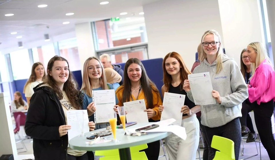 A group of students celebrating results