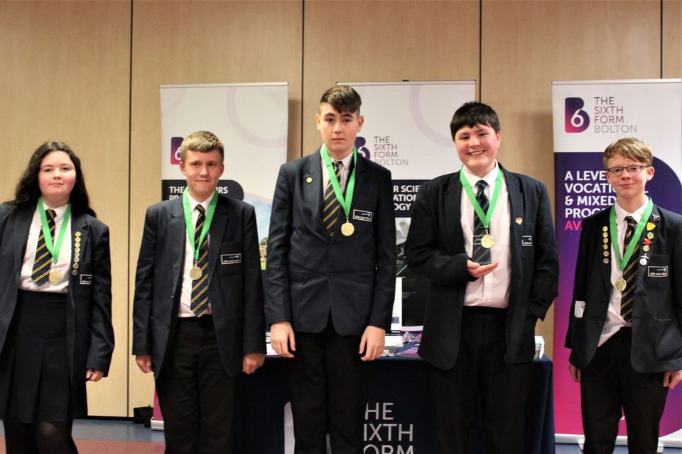 Group of school students with medals