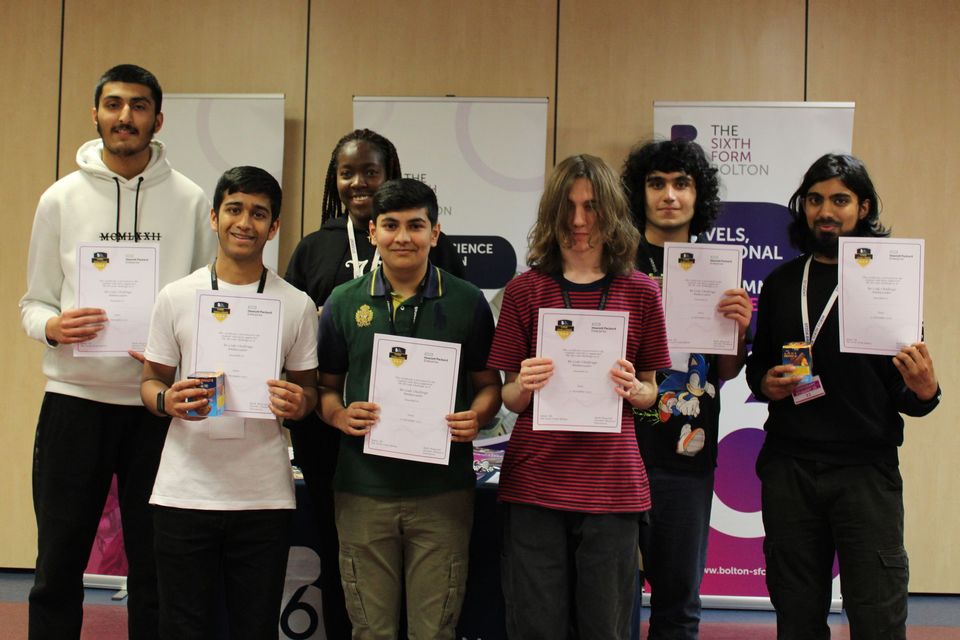 Group of school students with certificates