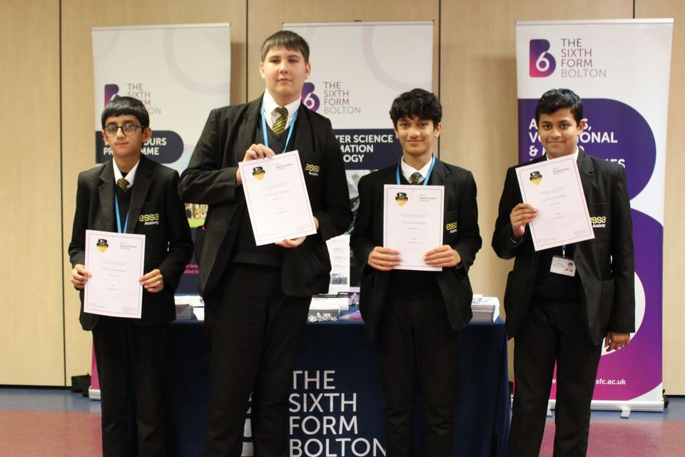 Group of school students with certificates