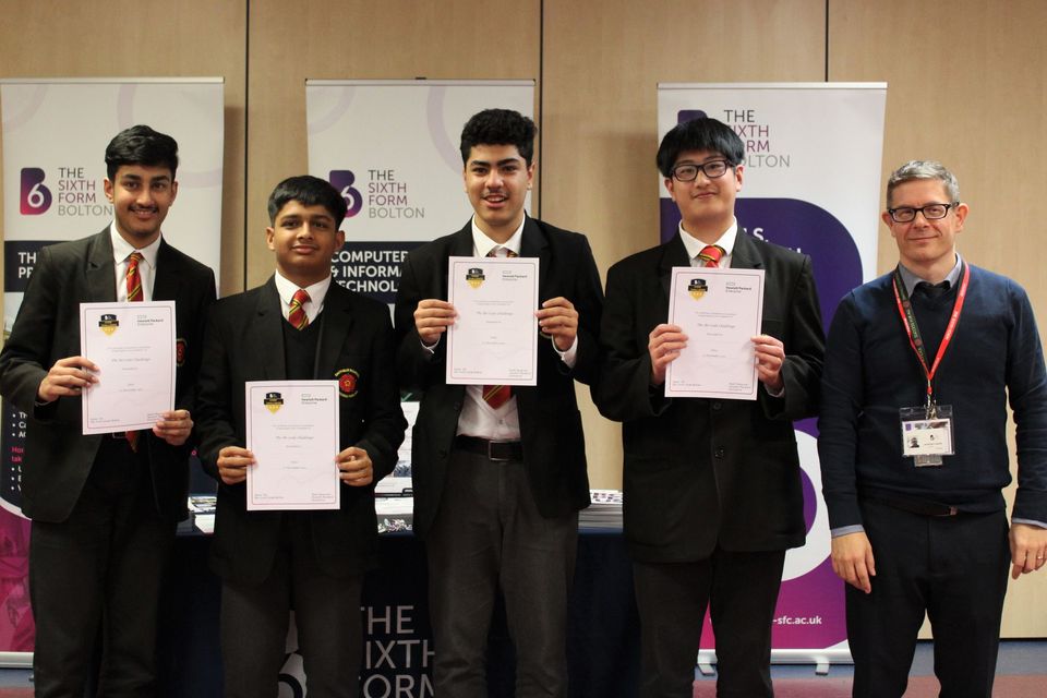 Group of school students with certificates