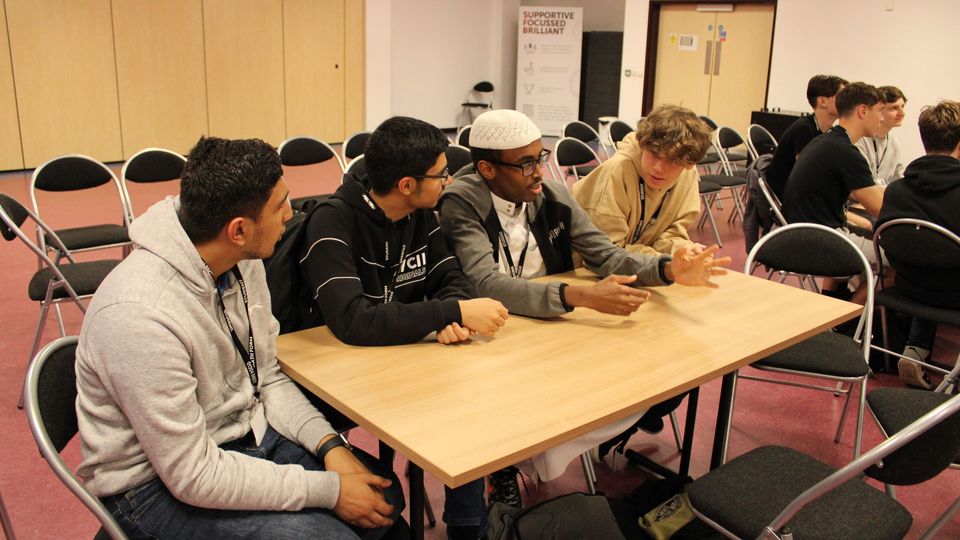 Students sat at table